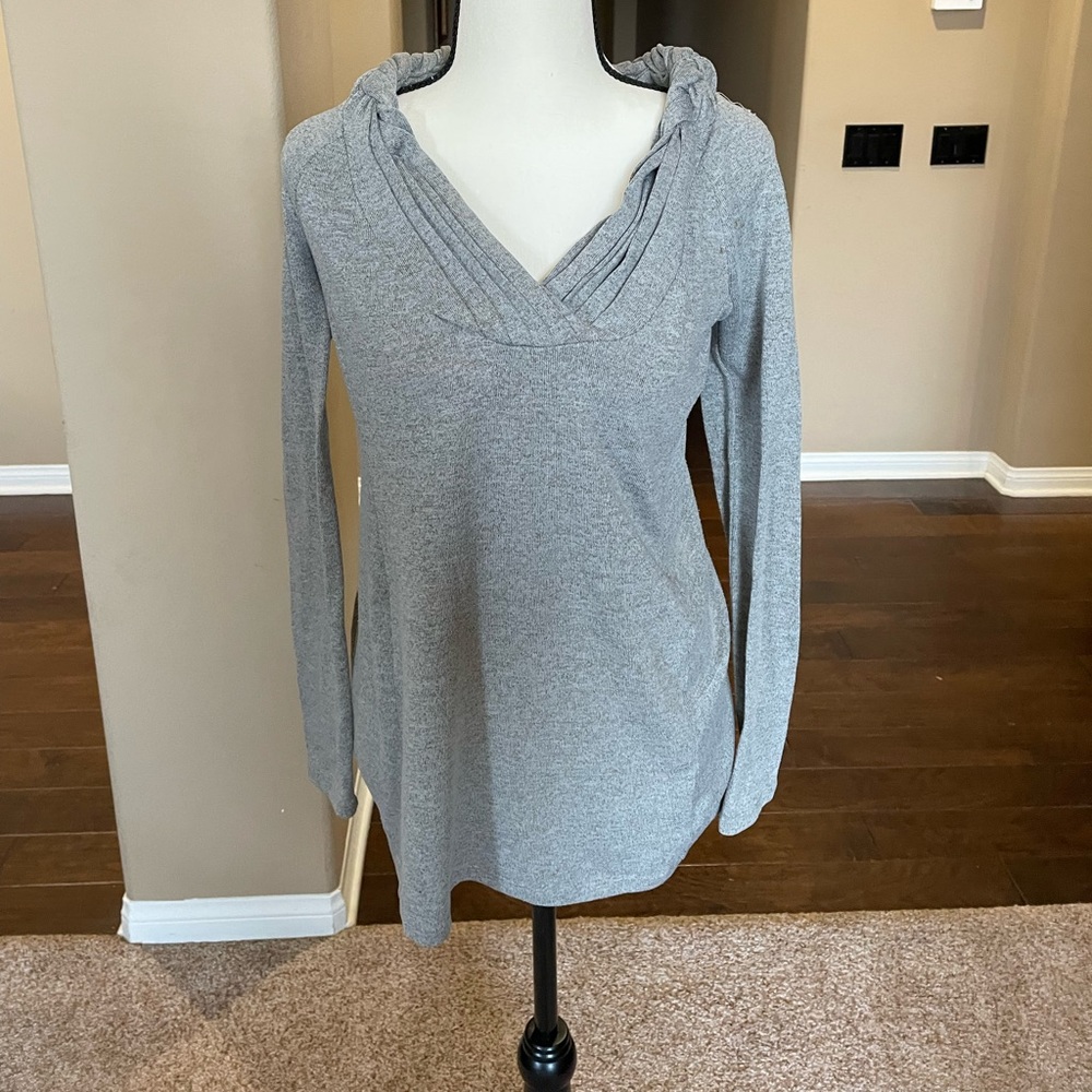 Gray long sleeve sweater with braid like tie around the collar